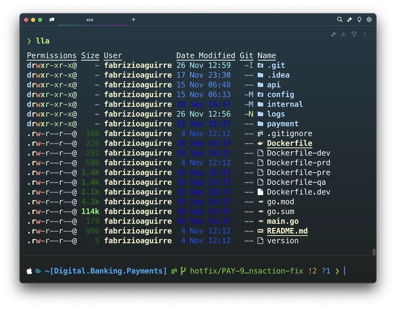 eza listing a project directory with colorized file types, Git status, and tree view.
